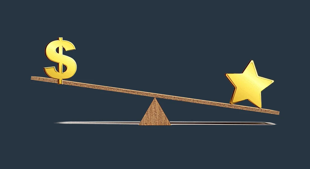 Balance scale with dollar and star